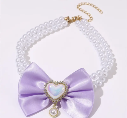 Collar de perlas c/detalle de moño lavanda. Talle S