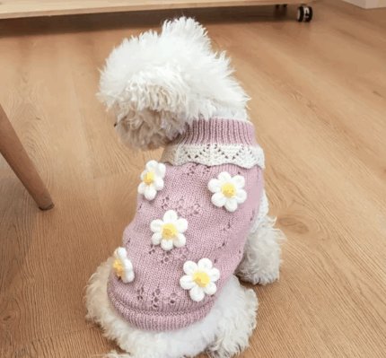 Sueter de punto rosa c/flores bordadas . Talle L