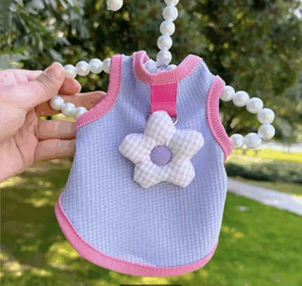 Remerita c/aplique de flor. Talle L