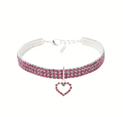 Gargantilla de piedras rosada con dije de corazon. Talle L