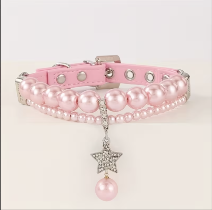 Gargantilla de perlas rosada decorada c/dije de estrella .Talle M