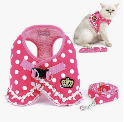 Arnes rosa a lunares decorado c/flores.Trae correa. Ajustable.Talle M